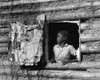 Alabama: Girl, 1937. /Na Girl In The Window Of Her Home At Gees Bend, Alabama. Photograph By Arthur Rothstein, 1937. Poster Print by Granger Collection - Item # VARGRC0259008