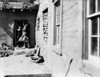 Zuni Pueblo, C1903. /Nzuni Native Americans In A Doorway In A Pueblo Village In The American Southwest. Photograph By Edward Curtis, C1903. Poster Print by Granger Collection - Item # VARGRC0118973