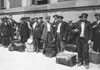 Immigrants: Ellis Island. /Na Group Of Italian Immigrant Men Preparing To Leave Ellis Island, C1900. Poster Print by Granger Collection - Item # VARGRC0015873