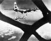 World War Ii: B-29, 1945. /Nincendiary Bombs From Two Boeing B-29 Superfortresses Drop On A Japanese Target. Photograph, 16 July 1945, Through The Nose Of A Superfortress. Poster Print by Granger Collection - Item # VARGRC0017579