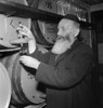 New York: Rabbi, 1942. /Na Rabbi Inspecting The Wine A Kosher Wine Shop In The New York City. Photograph By Marjory Collins, 1942. Poster Print by Granger Collection - Item # VARGRC0324339