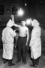 Immigration: Exam, 1921. /Nmembers Of The New York City Health Department Examining An Immigrant, Probably At Ellis Island. Photograph, 1921. Poster Print by Granger Collection - Item # VARGRC0185818
