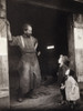 Blacksmith, C1900./Nan Blacksmith Standing In The Doorway Of His Forge Talking To Two Young Children. Photographed By Frances Stebbins Allen, C1900. Poster Print by Granger Collection - Item # VARGRC0120062