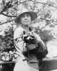 Grace Anna Coolidge /N(1879-1957). Wife Of President Calvin Coolidge. Photographed With Her Pet Raccoon, C1923. Poster Print by Granger Collection - Item # VARGRC0128490