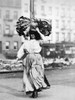 Home Industry, 1910. /Nitalian Immigrant Woman Carrying Cloth To Her Lower East Side New York Tenement Home. Photograph By Lewis Hine, 1910. Poster Print by Granger Collection - Item # VARGRC0030708