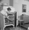 Icebox, 1942. /Na Woman Takes An Orange Out Of An Icebox In Her In Greenbelt, Mississippi. Photograph By Marjory Collins, 1942. Poster Print by Granger Collection - Item # VARGRC0114848
