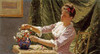 A Young Woman Arranging Flowers Poster Print by Emile Claus - Item # VARPDX267863