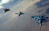 F-15 Eagles and a F-16 Fighting Falcon fly in formation Poster Print by Stocktrek Images - Item # VARPSTSTK102582M