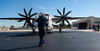 A  US Sailor signals to a C-2A Greyhound aircraft Poster Print by Stocktrek Images - Item # VARPSTSTK108462M