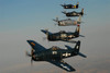 Formation of Grumman F8F Bearcats flying over Chino, California Poster Print by Phil Wallick/Stocktrek Images - Item # VARPSTPWA100069M