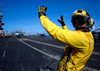 An aviation boatswain's mate directs a S-3B Viking aboard USS Enterprise Poster Print by Stocktrek Images - Item # VARPSTSTK101303M