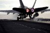 An F/A-18C Hornet rockets down the flight deck of USS Ronald Reagan Poster Print by Stocktrek Images - Item # VARPSTSTK102112M