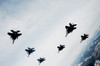 A six-ship formation of aircraft fly over the Sawtooth Mountains in Idaho Poster Print by Stocktrek Images - Item # VARPSTSTK103297M