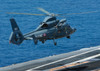A French Dolphin 35F helicopter takes off from the flight deck of USS John C Stennis Poster Print by Stocktrek Images - Item # VARPSTSTK102347M