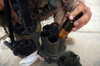 A Marine loads 40 mm grenades Poster Print by Stocktrek Images - Item # VARPSTSTK101831M