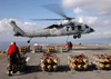 An MH-60S Knighthawk helicopter prepares for departure with a pallet of bombs Poster Print by Stocktrek Images - Item # VARPSTSTK100815M