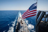 The national ensign flies from the mast aboard USS Stockdale Poster Print by Stocktrek Images - Item # VARPSTSTK107610M