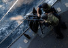 Sailors fire a dual-mounted M240 machine gun aboard USS Bunker Hill Poster Print by Stocktrek Images - Item # VARPSTSTK105572M