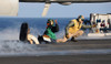 Airmen signal during a launch on the flight deck of USS Nimitz Poster Print by Stocktrek Images - Item # VARPSTSTK108172M