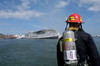 A US Navy Sailor responds to a shipboard fire Poster Print by Stocktrek Images - Item # VARPSTSTK102259M