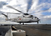 A Japanese Maritime Self-Defense Force MH-53 Sea Stallion lands on the flight deck of USS Denver Poster Print by Stocktrek Images - Item # VARPSTSTK104072M