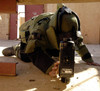 An EOD member places an x-ray machine near an Improvised Explosive Device Poster Print by Stocktrek Images - Item # VARPSTSTK100968M