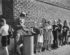 Boys and girls collect fats and greases then turn it over to school authorities circa 1942 Poster Print by Stocktrek Images - Item # VARPSTSTK500239A