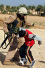 A soldier plays soccer with an Iraqi boy Poster Print by Stocktrek Images - Item # VARPSTSTK101924M