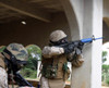 A Marine shoots at an enemy sniper Poster Print by Stocktrek Images - Item # VARPSTSTK102491M