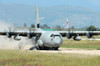 A C-130 Hercules of the Italian Air Force landing on an unpaved landing strip Poster Print by Remo Guidi/Stocktrek Images - Item # VARPSTRGU100061M