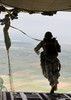 A US soldier jumps out of a C-130J Super Hercules Poster Print by Stocktrek Images - Item # VARPSTSTK105768M