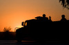 A US Army Humvee with soldiers in the back at sunset Poster Print by Terry Moore/Stocktrek Images - Item # VARPSTTMO100018M