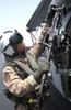 Aviation Warfare Systems Operator safety checks a 50-caliber machine gun on an SH-60F Seahawk Poster Print by Stocktrek Images - Item # VARPSTSTK100519M