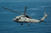 An MH-60R Sea Hawk maneuvers over the South China Sea Poster Print by Stocktrek Images - Item # VARPSTSTK107599M