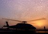 An SH-60F Seahawk backdropped against the sunset Poster Print by Stocktrek Images - Item # VARPSTSTK100799M