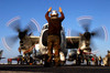 Airmam instructs the pilots of a C-2A Greyhound Poster Print by Stocktrek Images - Item # VARPSTSTK100733M