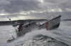 US Coast Guard Motor Life Boat brakes a wave during a rescue at sea exercise Poster Print by Stocktrek Images - Item # VARPSTSTK100440M