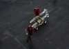 Marines move ordnance on the flight deck of USS Nimitz Poster Print by Stocktrek Images - Item # VARPSTSTK107636M