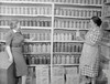 Two women standing in a kitchen pantry circa 1946 Poster Print by Stocktrek Images - Item # VARPSTSTK500240A