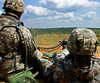 Soldier feeds ammunition to his gunner during M2 50-caliber weapon training at Camp Shelby Poster Print by Stocktrek Images - Item # VARPSTSTK105115M