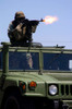 Soldier shoots a M-240B machine gun atop a humvee Poster Print by Stocktrek Images - Item # VARPSTSTK100578M