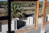 A rocket-propelled grenade detonated on the second floor balcony of a patrol post Poster Print by Stocktrek Images - Item # VARPSTSTK101801M
