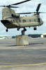 Soldiers attach a container to a CH-47F Chinook slingload hook Poster Print by Stocktrek Images - Item # VARPSTSTK106542M