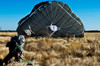 US Army soldier lands after a static line airdrop Poster Print by Stocktrek Images - Item # VARPSTSTK106973M