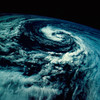 Swirling Clouds from Space Poster Print by Stocktrek Images - Item # VARPSTSTK201128S