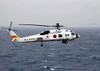 A Japan Maritime Self Defense Force H-60 helicopter in flight Poster Print by Stocktrek Images - Item # VARPSTSTK101326M