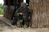 US Marines prepare to enter a house during a raid Poster Print by Stocktrek Images - Item # VARPSTSTK102018M