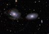 Gravitionaly distorted Galaxies NGC 3169 and NGC 3166 Poster Print by Ken Crawford/Stocktrek Images - Item # VARPSTCRA100019S