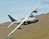 A C-130J Super Hercules low flying over North Wales on a training flight Poster Print by Andrew Chittock/Stocktrek Images - Item # VARPSTACH100023M