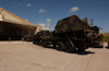 US Soldiers transport Patriot Advanced Capability missiles into a hangar Poster Print by Stocktrek Images - Item # VARPSTSTK106511M